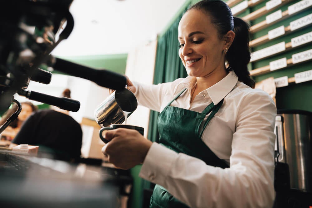 caucasian-female-barista-work-making-coffee